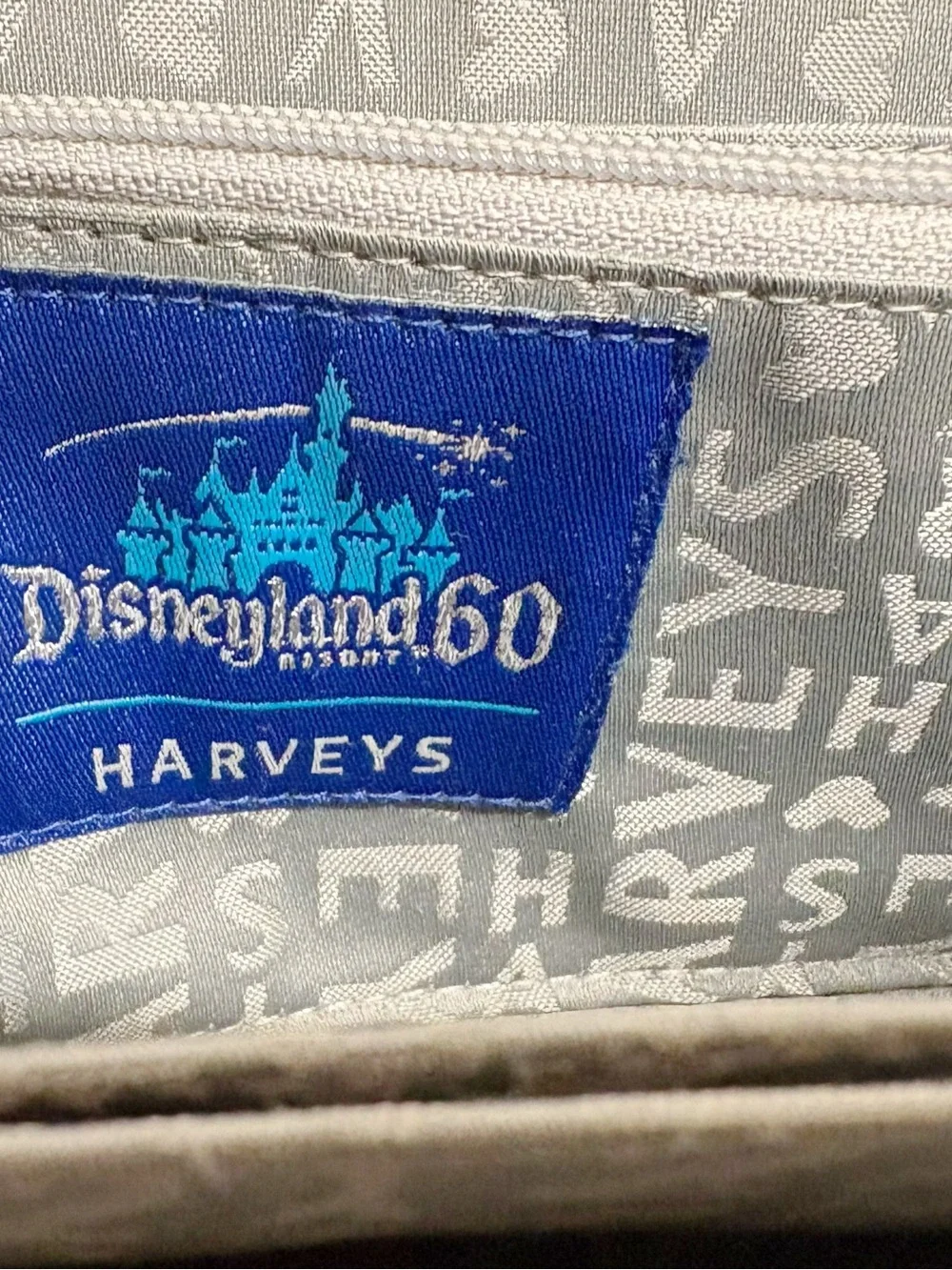 Harveys Black Multicolor Patchwork Disneyland Wristlet